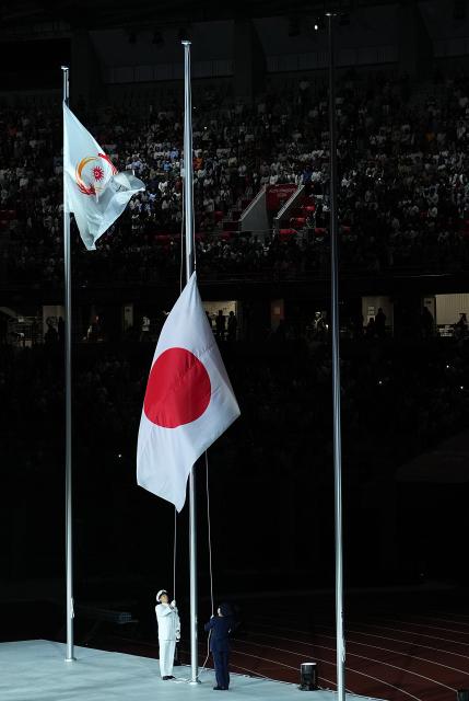 (261004) -- NAGOYA, Oct. 4, 2026 (Xinhua) -- The national flag of Japan is raised during the closing ceremony of the 20th Asian Games Aichi-Nagoya 2026 in Nagoya, Japan, Oct. 4, 2026. (Xinhua/Cheong Kam Ka)