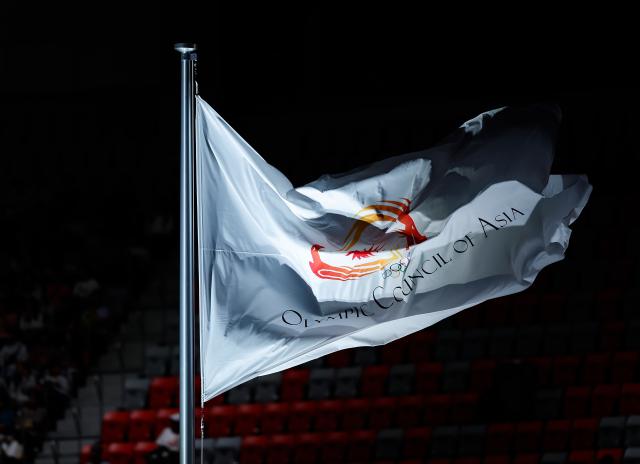 (261004) -- NAGOYA, Oct. 4, 2026 (Xinhua) -- The flag of Olympic Council of Asia (OCA) is seen before the closing ceremony of the 20th Asian Games Aichi-Nagoya 2026 in Nagoya, Japan, Oct. 4, 2026. (Xinhua/Wu Zhizun)