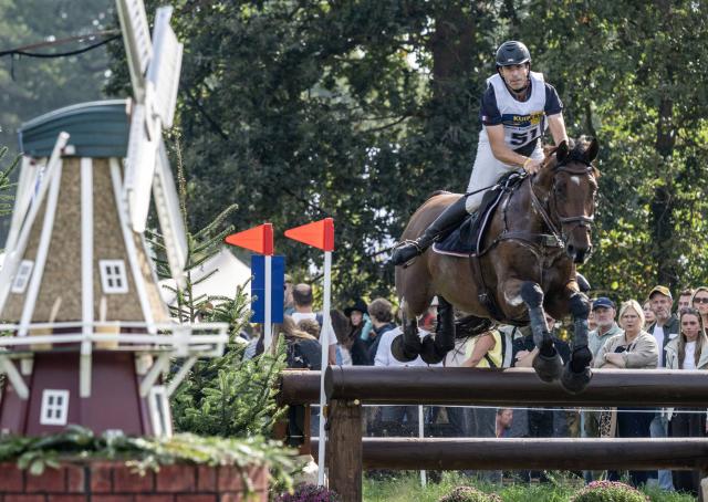 (261004) -- ENSCHEDE, Oct. 4, 2026 (Xinhua) -- A participant competes during the cross-country phase of the 55th Military Boekelo-Enschede in village Boekelo of Enschede, the Netherlands, Oct. 3, 2026. Military Boekelo-Enschede is a major international equestrian event held annually in Boekelo in the eastern Netherlands since 1971. The FEI four-star long-format eventing competition combines three disciplines: dressage, cross-country and show jumping. (Photo by Eric Brinkhorst/Xinhua)