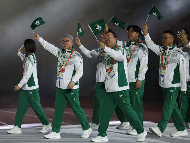 (261004) -- NAGOYA, Oct. 4, 2026 (Xinhua) -- Delegation of Macao of China parade into the stadium during the closing ceremony of the 20th Asian Games Aichi-Nagoya 2026 in Nagoya, Japan, Oct. 4, 2026. (Xinhua/Jia Haocheng)