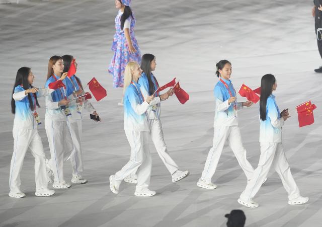 (261004) -- NAGOYA, Oct. 4, 2026 (Xinhua) -- Delegation of China parade into the stadium during the closing ceremony of the 20th Asian Games Aichi-Nagoya 2026 in Nagoya, Japan, Oct. 4, 2026. (Xinhua/Jia Yuchen)