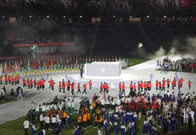 (261004) -- NAGOYA, Oct. 4, 2026 (Xinhua) -- Delegation of Japan parade into the stadium during the closing ceremony of the 20th Asian Games Aichi-Nagoya 2026 in Nagoya, Japan, Oct. 4, 2026. (Xinhua/Jia Yuchen)