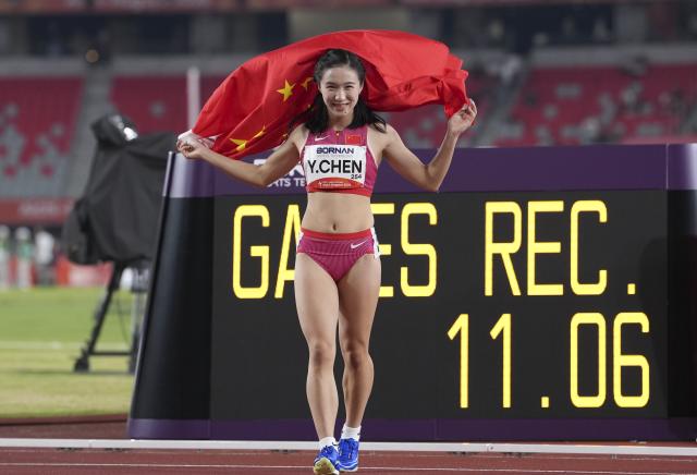 (261004) -- NAGOYA, Oct. 4, 2026 (Xinhua) -- Chen Yujie of China celebrates after winning the women's 100m final of Athletics at the 20th Asian Games Aichi-Nagoya 2026 in Nagoya, Japan, Sept. 25, 2026. (Xinhua/Lui Siu Wai)