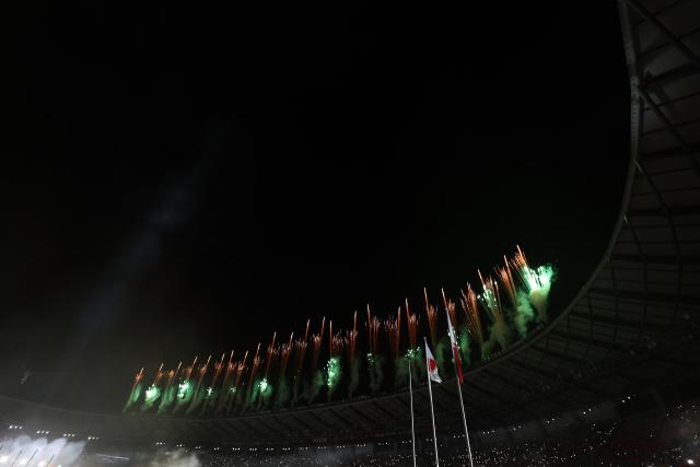 (261004) -- NAGOYA, Oct. 4, 2026 (Xinhua) -- Fireworks are seen during the closing ceremony of the 20th Asian Games Aichi-Nagoya 2026 in Nagoya, Japan, Oct. 4, 2026. (Xinhua/Jia Haocheng)