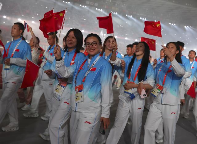 (261004) -- NAGOYA, Oct. 4, 2026 (Xinhua) -- Delegation of China attend the closing ceremony of the 20th Asian Games Aichi-Nagoya 2026 in Nagoya, Japan, Oct. 4, 2026. (Xinhua/Jia Haocheng)