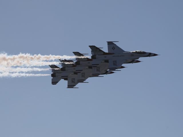 (261004) -- HUNTINGTON BEACH, Oct. 4, 2026 (Xinhua) -- Aircraft of the U.S. Air Force Thunderbirds perform during the Pacific Airshow in the city of Huntington Beach, Orange County, California, the United States, Oct. 3, 2026. The Pacific Airshow, one of the largest of its kind in the United States, kicked off here on Friday. (Photo by Qiu Chen/Xinhua)