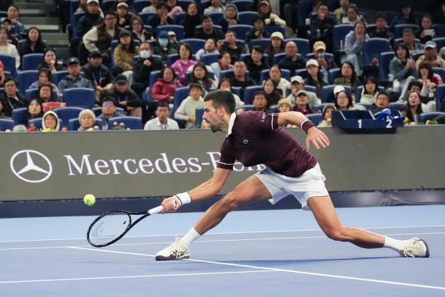(261004) -- BEIJING, Oct. 4, 2026 (Xinhua) -- Novak Djokovic competes during the men's singles quarterfinal match between Alexander Zverev of Germany and Novak Djokovic of Serbia at 2026 China Open tennis tournament in Beijing, China, Oct. 4, 2026. (Xinhua/Ju Huanzong)