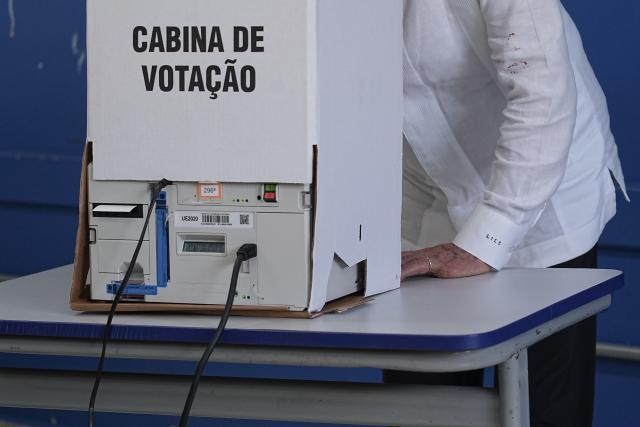 (261004) -- BRASILIA, Oct. 4, 2026 (Xinhua) -- Brazilian President Luiz Inacio Lula da Silva, presidential candidate of Brazil's ruling Workers' Party, casts his ballot at a polling station in Sao Bernardo do Campo, Brazil, Oct. 4, 2026. Voting in the first round of Brazil's 2026 presidential election officially began at 8 a.m. (1100 GMT) on Sunday, with polling stations across the country scheduled to close at 5 p.m. (0800 GMT).
   Initial results are expected to be announced within a few hours after the polls close. (Photo by Paulo Lopes/Xinhua)