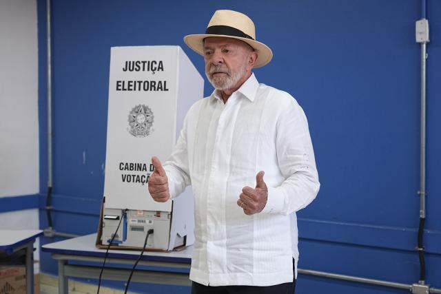 (261004) -- BRASILIA, Oct. 4, 2026 (Xinhua) -- Brazilian President Luiz Inacio Lula da Silva, presidential candidate of Brazil's ruling Workers' Party, gestures after casting his ballot at a polling station in Sao Bernardo do Campo, Brazil, Oct. 4, 2026. Voting in the first round of Brazil's 2026 presidential election officially began at 8 a.m. (1100 GMT) on Sunday, with polling stations across the country scheduled to close at 5 p.m. (0800 GMT).
   Initial results are expected to be announced within a few hours after the polls close. (Photo by Paulo Lopes/Xinhua)