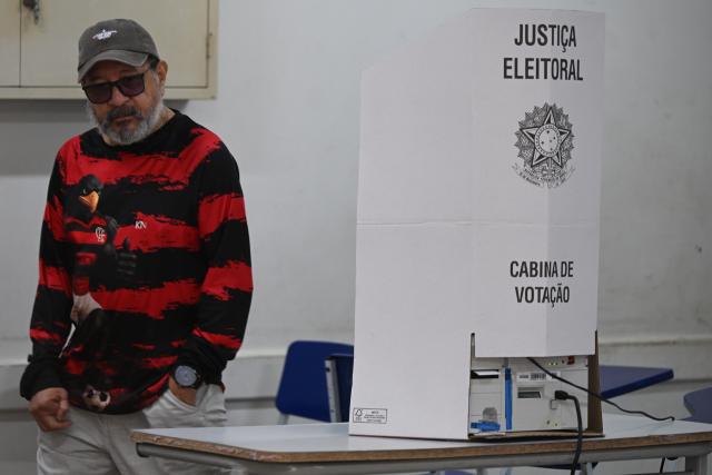 (261004) -- BRASILIA, Oct. 4, 2026 (Xinhua) -- A voter is seen after casting his ballot at a polling station in Brasilia, Brazil, Oct. 4, 2026. Voting in the first round of Brazil's 2026 presidential election officially began at 8 a.m. (1100 GMT) on Sunday, with polling stations across the country scheduled to close at 5 p.m. (0800 GMT).
   Initial results are expected to be announced within a few hours after the polls close. (Photo by Lucio Tavora/Xinhua)