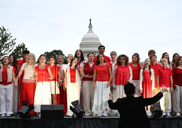 (261004) -- WASHINGTON, Oct. 4, 2026 (Xinhua) -- Members of One Voice Children's Choir perform during "Future Resonance -- ShanghaiEye Night" in Washington, D.C., the United States, on Oct. 3, 2026. The Shanghai-themed cultural exchange event was held here on Saturday, bringing a taste of Shanghai to the United States. The event was also part of the "Shanghai Let's Meet" city promotion initiative and a broader series of China-U.S. people-to-people exchanges. (Xinhua/Li Rui)