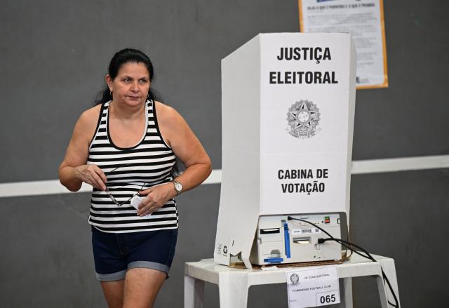 (261004) -- RIO DE JANEIRO, Oct. 4, 2026 (Xinhua) -- A voter is seen after casting her ballot at a polling station in Rio de Janeiro, Brazil, Oct. 4, 2026. Voting in the first round of Brazil's 2026 presidential election officially began at 8 a.m. (1100 GMT) on Sunday, with polling stations across the country scheduled to close at 5 p.m. (0800 GMT). Initial results are expected to be announced within a few hours after the polls close. (Xinhua/Jin Haoyuan)