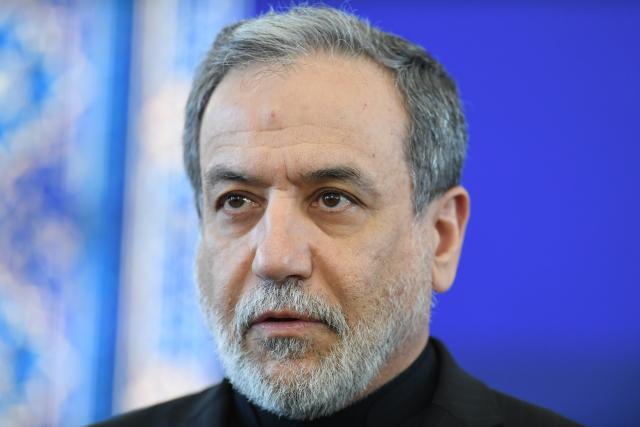 (261004) -- TEHRAN, Oct. 4, 2026 (Xinhua) -- Iran's Foreign Minister Seyed Abbas Araghchi attends a meeting with foreign ambassadors and diplomats in Tehran, Iran, on Oct. 4, 2026. Araghchi said on Sunday the country is still ready to achieve a "just and honorable" solution through diplomacy, but it will give a "more crushing" response if the "enemies" once again resort to military actions. (Xinhua/Shadati)