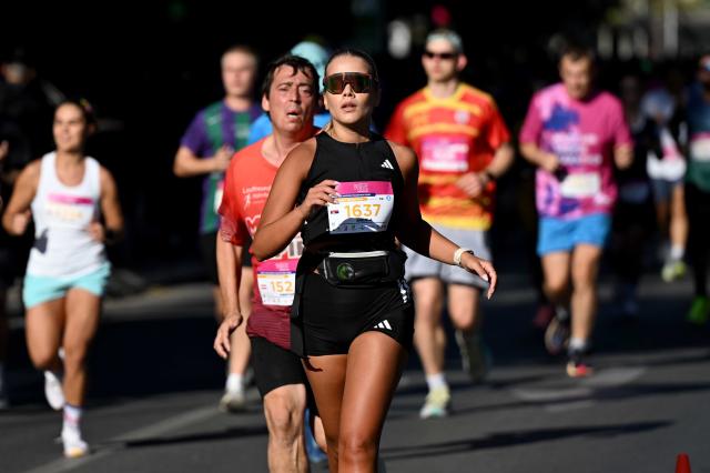 (261005) -- SKOPJE, Oct. 5, 2026 (Xinhua) -- Participants compete during Skopje Marathon in Skopje, North Macedonia, Oct. 4, 2026. (Photo by Tomislav Georgiev/Xinhua)