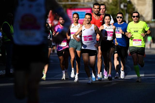 (261005) -- SKOPJE, Oct. 5, 2026 (Xinhua) -- Participants compete during Skopje Marathon in Skopje, North Macedonia, Oct. 4, 2026. (Photo by Tomislav Georgiev/Xinhua)
