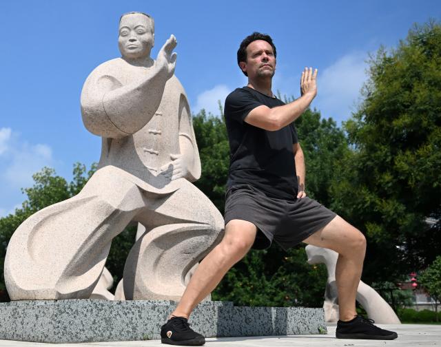 (261005) -- BEIJING, Oct. 5, 2026 (Xinhua) -- Joseph Dauey, a Taijiquan enthusiast from Britain, practices Taijiquan in Chenjiagou Village of Wenxian County, central China's Henan Province, Aug. 26, 2026. Social media users in the West have recently embraced "Chinamaxxing," in which young people show interest in aspects of Chinese daily life.
   Taijiquan, a kind of traditional martial arts, was born in the mid-17th century in Chenjiagou Village. Rooted in Chinese philosophy, traditional medicine and martial arts, Taijiquan has evolved into a wide range of styles and is now practiced in more than 180 countries and regions. For foreign visitors, Chenjiagou is naturally one of the best spots to experience the "Chinamaxxing" trend. The small village offers a tranquil and comfortable living environment which lets visitors get away from the busy pace of city life and immerse themselves in traditional Chinese culture. (Xinhua/Li Jianan)