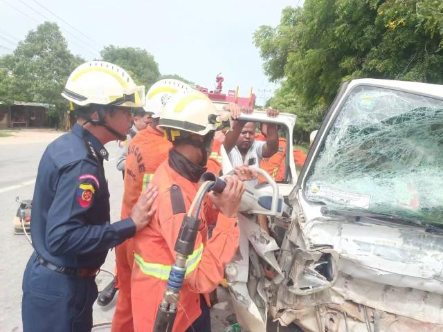 (261005) -- SAGAING, Oct. 5, 2026 (Xinhua) -- Rescuers work at the site of a road accident in Sagaing township of Sagaing region, Myanmar, Oct. 5, 2026. Ten people were killed and three others injured in a road accident in Myanmar's Sagaing region on Monday, according to the Myanmar Fire Services Department. (Myanmar Fire Services Department/Handout via Xinhua)