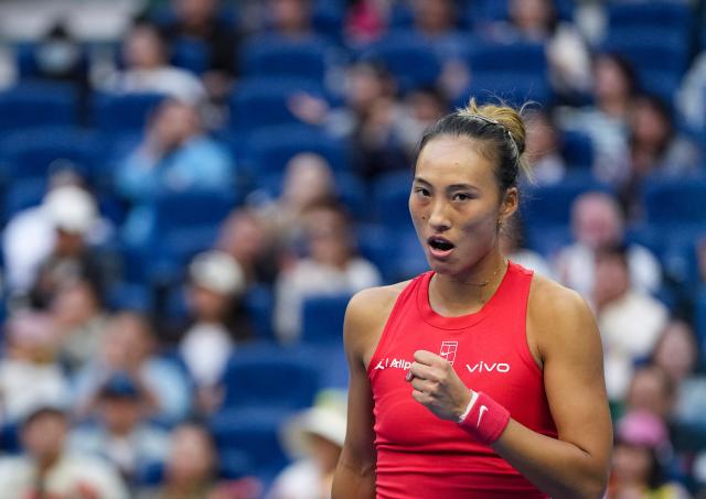 (261005) -- BEIJING, Oct. 5, 2026 (Xinhua) -- Zheng Qinwen of China celebrates scoring during the women's singles round of 32 match against Marie Bouzkova of the Czech Republic at 2026 China Open tennis tournament in Beijing, China, Oct. 5, 2026. (Xinhua/Sun Fei)