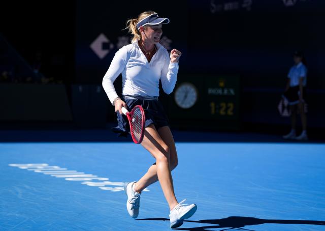 (261005) -- BEIJING, Oct. 5, 2026 (Xinhua) -- Donna Vekic of Croatia celebrates scoring during the women's singles round of 32 match against Iga Swiatek of Poland at 2026 China Open tennis tournament in Beijing, China, Oct. 5, 2026. (Xinhua/Sun Fei)