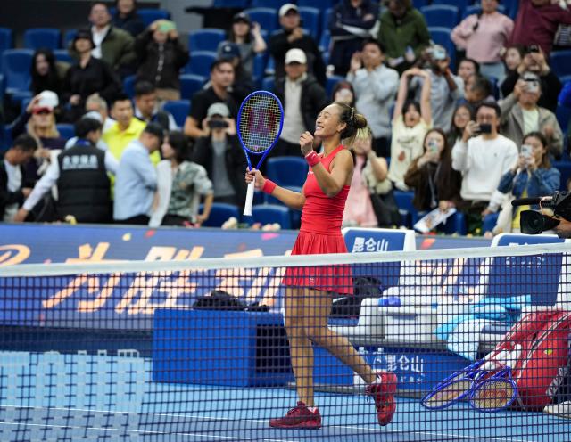 (261005) -- BEIJING, Oct. 5, 2026 (Xinhua) -- Zheng Qinwen of China celebrates victory after winning the women's singles round of 32 match against Marie Bouzkova of the Czech Republic at 2026 China Open tennis tournament in Beijing, China, Oct. 5, 2026. (Xinhua/Sun Fei)