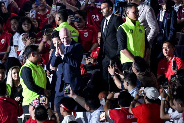 (261005) -- JAKARTA, Oct. 5, 2026 (Xinhua) -- FIFA President Gianni Infantino (front, 2nd L) is seen during the closing ceremony before the FIFA ASEAN Cup 2026 Division 1 Final Match between Indonesia and Thailand at Gelora Bung Karno Stadium in Jakarta, Indonesia, Oct. 5, 2026. (Xinhua/Agung Kuncahya B.)