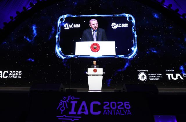 (261005) -- ANTALYA, Oct. 5, 2026 (Xinhua) -- Turkish President Recep Tayyip Erdogan addresses the opening of the 77th International Astronautical Congress in Antalya, Türkiye, Oct. 5, 2026. The 77th International Astronautical Congress kicked off Monday in Antalya, Türkiye's Mediterranean resort city, gathering space leaders, researchers and industry representatives from across the globe. (Mustafa Kaya/Handout via Xinhua)