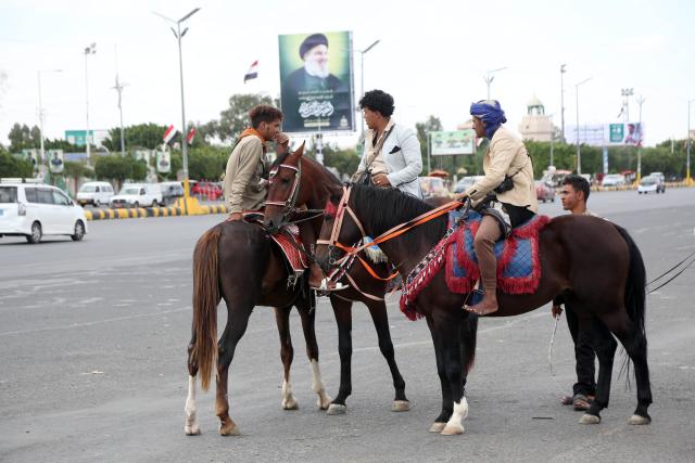 (261005) -- SANAA, Oct. 5, 2026 (Xinhua) -- Yemenis ride their horses in a street in the Houthi-held capital of Sanaa, Yemen, Oct. 5, 2026. (Photo by Mohammed Mohammed/Xinhua)
