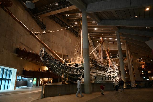 (261006) -- STOCKHOLM, Oct. 6, 2026 (Xinhua) -- This photo taken on Oct. 5, 2026 shows the warship Vasa inside the Vasa Museum in Stockholm, Sweden. The Vasa Museum in Stockholm, Sweden, features the 17th-century warship Vasa as its centerpiece. Through the ship, artifacts and themed exhibitions, the museum tells the story of the vessel's construction, sinking and salvage. The Vasa sank on its maiden voyage in 1628 and was salvaged more than 300 years later. It is one of the best-preserved 17th-century ships in the world. (Xinhua/Lyu You)