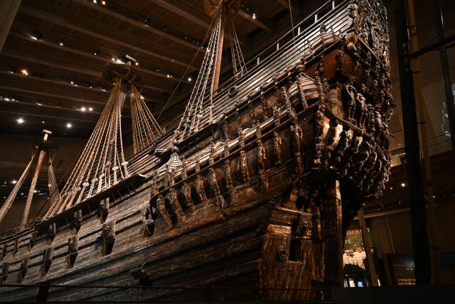 (261006) -- STOCKHOLM, Oct. 6, 2026 (Xinhua) -- This photo taken on Oct. 5, 2026 shows part of the warship Vasa inside the Vasa Museum in Stockholm, Sweden. The Vasa Museum in Stockholm, Sweden, features the 17th-century warship Vasa as its centerpiece. Through the ship, artifacts and themed exhibitions, the museum tells the story of the vessel's construction, sinking and salvage. The Vasa sank on its maiden voyage in 1628 and was salvaged more than 300 years later. It is one of the best-preserved 17th-century ships in the world. (Xinhua/Lyu You)