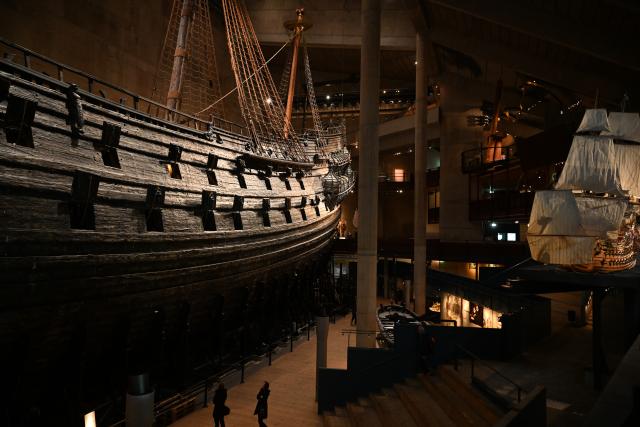 (261006) -- STOCKHOLM, Oct. 6, 2026 (Xinhua) -- This photo taken on Oct. 5, 2026 shows the interior of the Vasa Museum in Stockholm, Sweden. The Vasa Museum in Stockholm, Sweden, features the 17th-century warship Vasa as its centerpiece. Through the ship, artifacts and themed exhibitions, the museum tells the story of the vessel's construction, sinking and salvage. The Vasa sank on its maiden voyage in 1628 and was salvaged more than 300 years later. It is one of the best-preserved 17th-century ships in the world. (Xinhua/Lyu You)