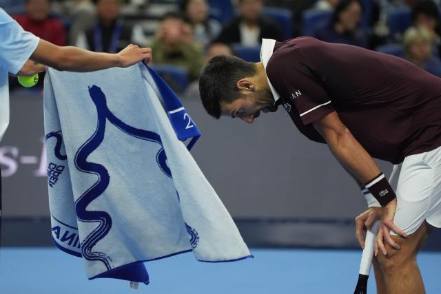 (261006) -- BEIJING, Oct. 6, 2026 (Xinhua) -- Novak Djokovic reacts during the men's singles semifinal match between Daniil Medvedev of Russia and Novak Djokovic of Serbia at 2026 China Open tennis tournament in Beijing, China, Oct. 5, 2026. (Xinhua/Xie Han)