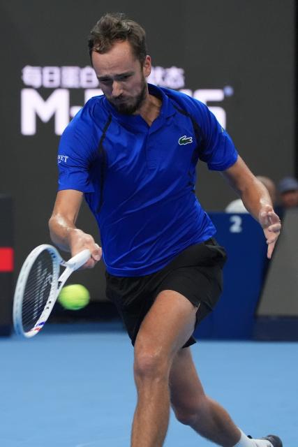 (261006) -- BEIJING, Oct. 6, 2026 (Xinhua) -- Daniil Medvedev competes during the men's singles semifinal match between Daniil Medvedev of Russia and Novak Djokovic of Serbia at 2026 China Open tennis tournament in Beijing, China, Oct. 5, 2026. (Xinhua/Xie Han)