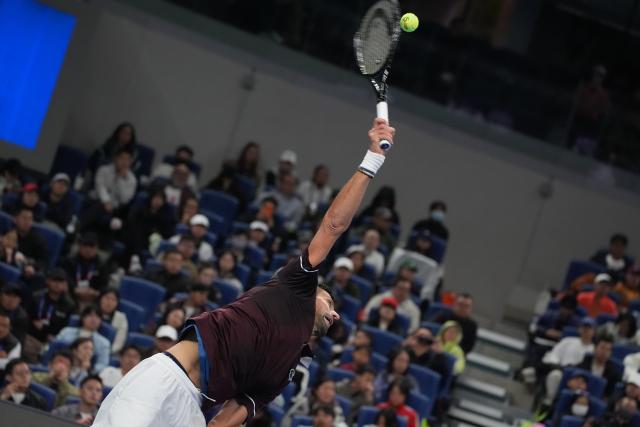 (261006) -- BEIJING, Oct. 6, 2026 (Xinhua) -- Novak Djokovic serves during the men's singles semifinal match between Daniil Medvedev of Russia and Novak Djokovic of Serbia at 2026 China Open tennis tournament in Beijing, China, Oct. 5, 2026. (Xinhua/Xie Han)