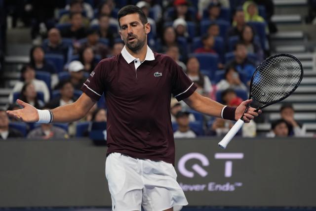 (261006) -- BEIJING, Oct. 6, 2026 (Xinhua) -- Novak Djokovic reacts during the men's singles semifinal match between Daniil Medvedev of Russia and Novak Djokovic of Serbia at 2026 China Open tennis tournament in Beijing, China, Oct. 5, 2026. (Xinhua/Xie Han)