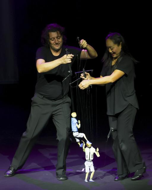(261006) -- SHANGHAI, Oct. 6, 2026 (Xinhua) -- Artists from Australia stage a puppet show at the opening ceremony of the 10th "Golden Magnolia" Shanghai International Puppet Art Week in east China's Shanghai, Oct. 5, 2026. The art week, themed "See the World, See You and Me, Enjoy the Future," opened here on Monday. (Xinhua/Wang Xiang)