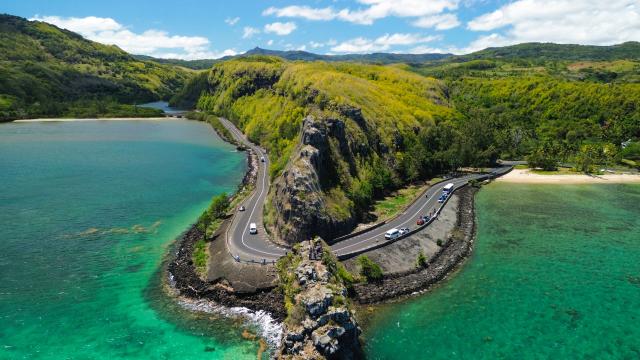 (261006) -- PORT LOUIS, Oct. 6, 2026 (Xinhua) -- An aerial drone photo taken on Oct. 5, 2026 shows a view of coastal scenery in Savanne District, Mauritius. (Xinhua/Chen Wei)