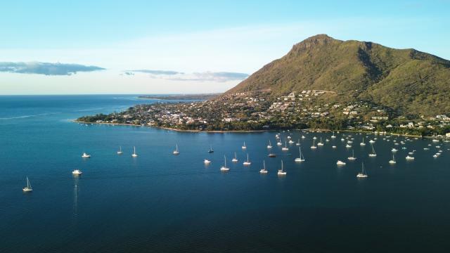 (261006) -- PORT LOUIS, Oct. 6, 2026 (Xinhua) -- An aerial drone photo taken on Oct. 2, 2026 shows a view of coastal scenery in Black River District, Mauritius. (Xinhua/Chen Wei)