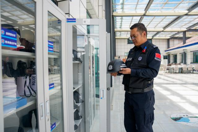 (261006) -- LHASA, Oct. 6, 2026 (Xinhua) -- Head of the Pumaqangtang border police station arranges police equipment in Pumaqangtang Township in Shannan, southwest China's Xizang Autonomous Region, Aug. 19, 2026. Pumaqangtang, China's highest township, has an average altitude of 5,373 meters, with oxygen levels less than a half of that at sea level.
   Here stands the Pumaqangtang border police station, the highest-altitude border police station in China. Police and auxiliary police officers here, with an average age of just over 30, hold their posts on the frigid, oxygen-thin plateau. (Xinhua/Tenzin Nyida)