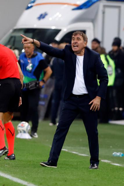 (261006) -- BUCHAREST, Oct. 6, 2026 (Xinhua) -- Romania's head coach Gheorghe Hagi gestures during the UEFA Nations League 2026/27 League B Group B4 match between Romania and Sweden in Bucharest, Romania, Oct. 5, 2026. (Photo by Cristian Cristel/Xinhua)