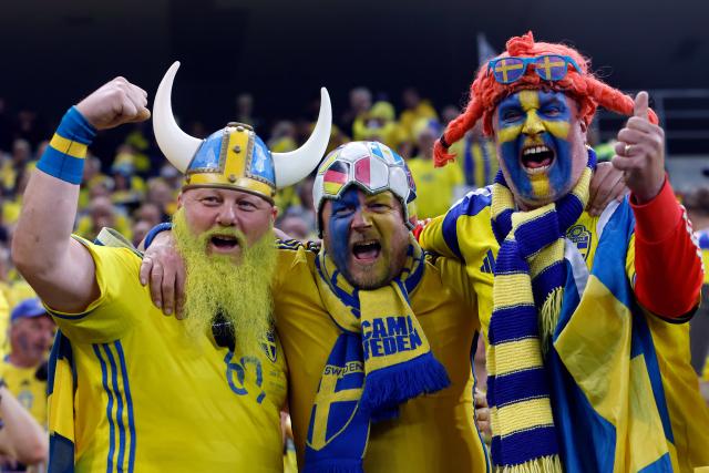 (261006) -- BUCHAREST, Oct. 6, 2026 (Xinhua) -- Swedish supporters celebrate after the UEFA Nations League 2026/27 League B Group B4 match between Romania and Sweden in Bucharest, Romania, Oct. 5, 2026. (Photo by Cristian Cristel/Xinhua)