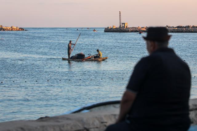 (261006) -- GAZA CITY, Oct. 6, 2026 (Xinhua) -- Fishermen fish along the seashore in Gaza City, Sept. 10, 2026. The latest round of Gaza conflict will mark its third anniversary on Oct. 7. (Photo by Rizek Abdeljawad/Xinhua)