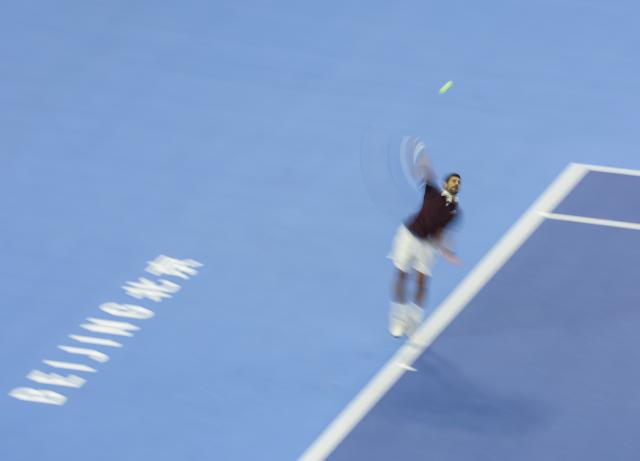 (261006) -- BEIJING, Oct. 6, 2026 (Xinhua) -- Novak Djokovic of Serbia serves during the men's singles final match against Alex de Minaur of Australia at 2026 China Open tennis tournament in Beijing, China, Oct. 6, 2026. (Xinhua/Bai Xuefei)