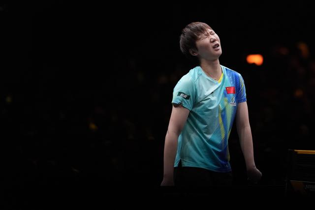 (261006) -- BEIJING, Oct. 6, 2026 (Xinhua) -- Wang Manyu of China reacts during the women's singles round of 32 match against Manika Batra of India at 2025 World Table Tennis (WTT) China Smash in Beijing, China, Oct. 6, 2026. (Xinhua/Xie Han)
