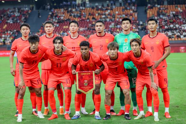 (261006) -- CHONGQING, Oct. 6, 2026 (Xinhua) -- Starting players of China pose for photo before the CFA Team China International Football Competitions Chongqing 2026 between China and Tajikistan in Chongqing, Oct. 6, 2026. (Xinhua/Huang Wei)