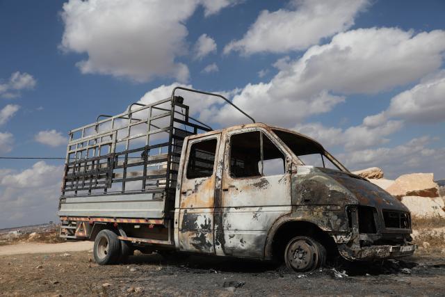 (261006) -- HEBRON, Oct. 6, 2026 (Xinhua) -- A vehicle burnt by Israeli settlers is seen in the town of al-Samu, south of Hebron in the West Bank, Oct. 6, 2026. (Photo by Mamoun Wazwaz/Xinhua)