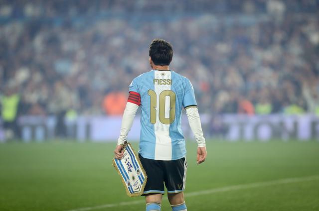 (261007) -- BUENOS AIRES, Oct. 7, 2026 (Xinhua) -- Lionel Messi of Argentina walks on the pitch before a football friendly match between Argentina and Benin at the Monumental Stadium in Buenos Aires, capital of Argentina, on Oct. 6, 2026. The match marked Lionel Messi's final appearance for the Argentina national football team. (Photo by Martin Zabala/Xinhua)