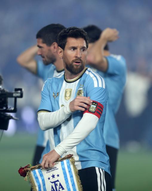 (261007) -- BUENOS AIRES, Oct. 7, 2026 (Xinhua) -- Lionel Messi of Argentina wears the captain arm band before a football friendly match between Argentina and Benin at the Monumental Stadium in Buenos Aires, capital of Argentina, on Oct. 6, 2026. The match marked Lionel Messi's final appearance for the Argentina national football team. (Photo by Martin Zabala/Xinhua)