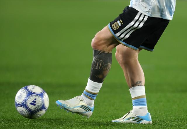 (261007) -- BUENOS AIRES, Oct. 7, 2026 (Xinhua) -- Lionel Messi of Argentina warms up before a football friendly match between Argentina and Benin at the Monumental Stadium in Buenos Aires, capital of Argentina, on Oct. 6, 2026. The match marked Lionel Messi's final appearance for the Argentina national football team. (Photo by Martin Zabala/Xinhua)