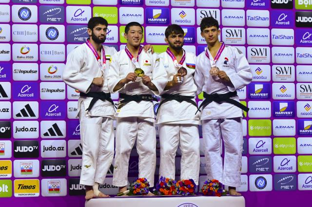 (261007) -- BAKU, Oct. 7, 2026 (Xinhua) -- (L to R) Silver medalist Makhmadbek Makhmadbekov of the United Arab Emirates, gold medalist Tanaka Ryuga of Japan, bronze medalists Rashid Mammadaliyev of Azerbaijan and Dayyan Boulemtafes of France pose for a group photo on the podium for the men's -73 kg event at the 2026 World Senior Judo Championships in Baku on Oct. 6, 2026. (Xinhua/Chen Junfeng)