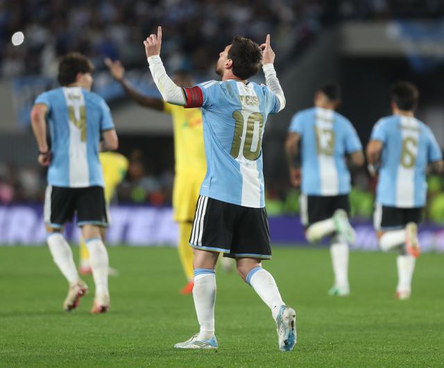 (261007) -- BUENOS AIRES, Oct. 7, 2026 (Xinhua) -- Lionel Messi (front) of Argentina celebrates after scoring during a football friendly match between Argentina and Benin at the Monumental Stadium in Buenos Aires, capital of Argentina, on Oct. 6, 2026. The match marked Lionel Messi's final appearance for the Argentina national football team. (Photo by Martin Zabala/Xinhua)